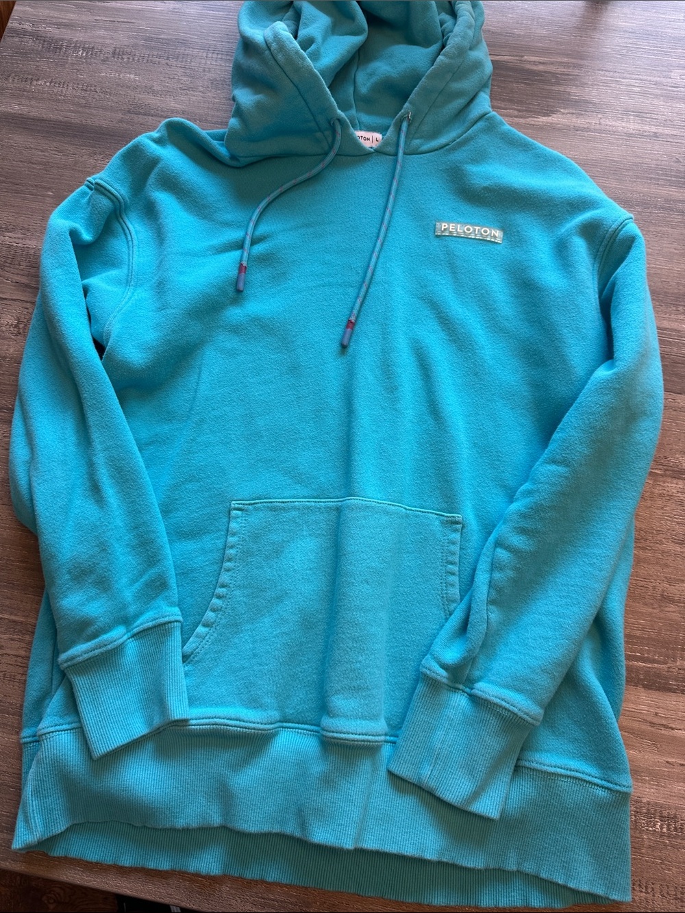 Peloton women’s Teal Pullover Hoodie with Kangaroo Pocket